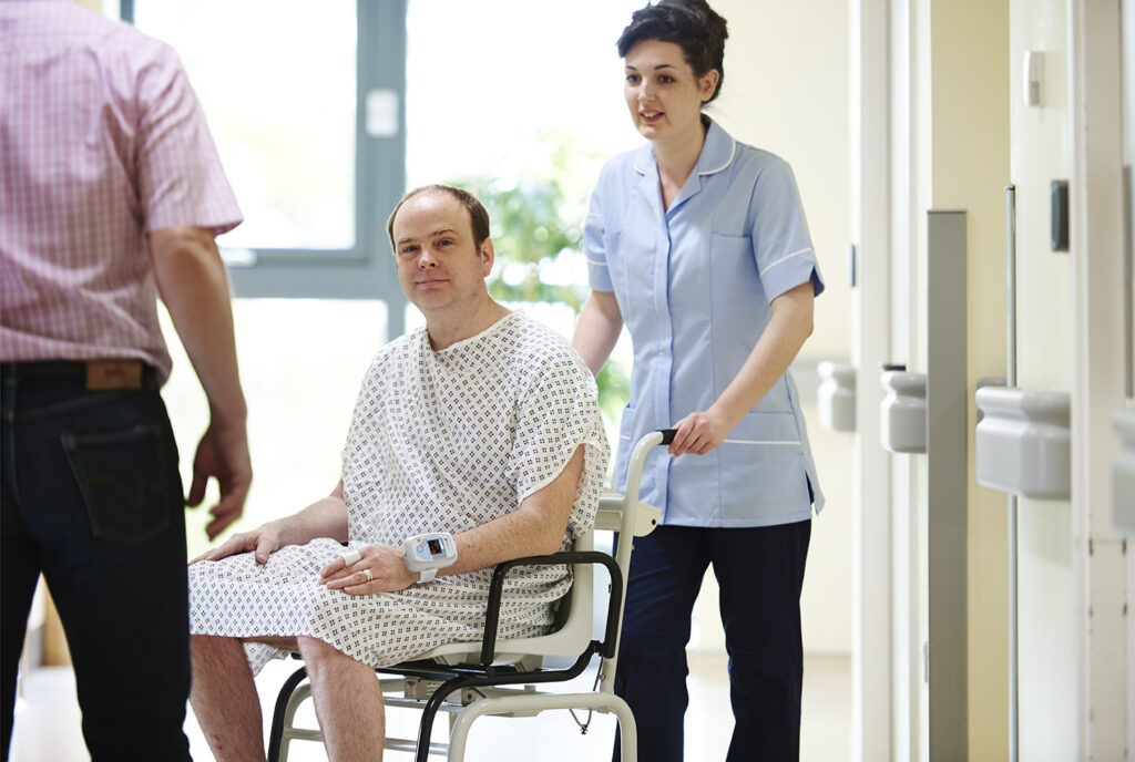 hospital patient with vitals monitor